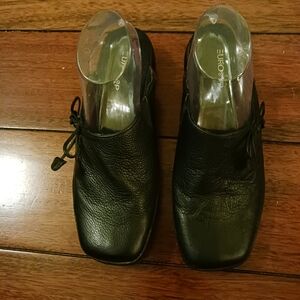 Sleek Black Mules Comfortable and Versatile Footwear